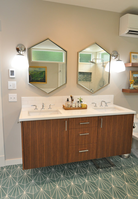 closeup of sinks with double mirrors