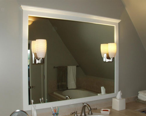 A mirror adds space to the bathroom