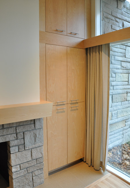 closeup of storage space beside fireplace
