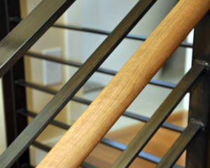 and the steel railings and oak handrail carry the same finishes through from the floor below