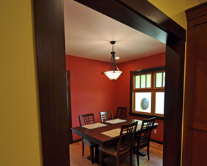 Where the cramped kitchen once stood is now a serene and beautiful dining room