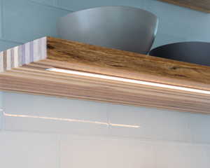 closeup of shelves with lighting underneath